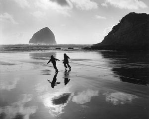 3476 Children pulling Sea Weed at Pacific City Oregon